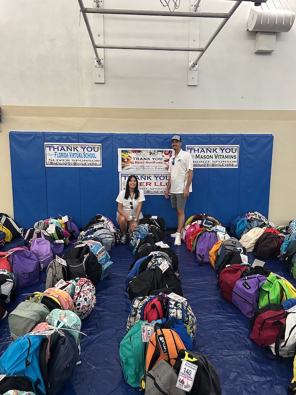 Community Outreach - Filing backpacks for kids
