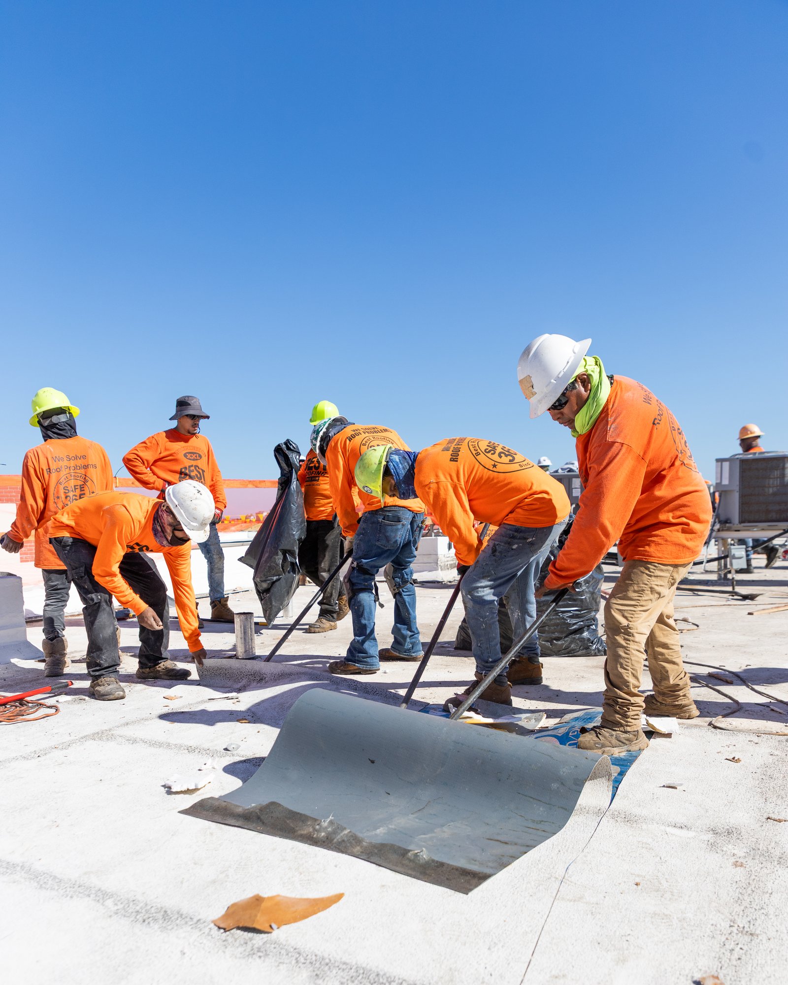 Roofing crew working on a roof
